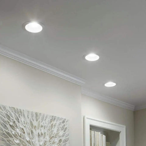 Daylight LED BR30 Dimmable Flood Bulb for Home and Outdoors 65W Replacement illuminating a modern living room ceiling