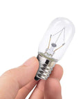 Person holding a Six Pack 125V 25W Microwave Light Bulb T8 E17 Base Clear Glass Replacement, showing the bulb size and glass finish.