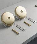 ANDRESLAD Single Hole Bathtub Overflow Drain Plate Pack of 2 with Screw in gold, displaying two round overflow plates and screws.