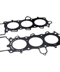 Two Piece Motorcycle Cylinder Head Gasket Kit Boss Level Straight Drop In Upgrade for Reliable Honda Bike Seals view from above.
