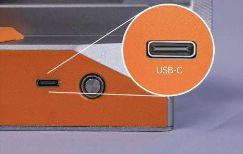 Desktop Mini Vise Dope For Soldering And DIY Projects With Adjustable Grip And Built In Lighting Magnifying Glass Attachment Smoke Exhaust Fan Ideal For Electronics Fine Crafting Repairs And Delicate Assemblies, USB-C port close-up