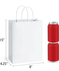 25 Pack White Gift Bags With Handles, 8 x 4.25 x 10.5 Inch Kraft Paper Bag next to two stacked red cans, eco friendly