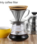 Pour Over Coffee Dripper In 304 Stainless Steel V Shape Slow Drip Filter on glass carafe next to kettle, Size L