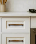 10 Pack 4 Inch Center To Center Antique Brass Cabinet Pulls installed on white kitchen cabinets