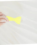 Hand smoothing Drywall Repair Putty Paste For Quick Hole Patching And Wall Mending Cream on white wall with yellow tool