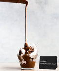 Coconut dark chocolate treat in a glass bowl with 20 Piece Mini Chalkboard Signs For Food, Reusable Buffet Table Labels visible.