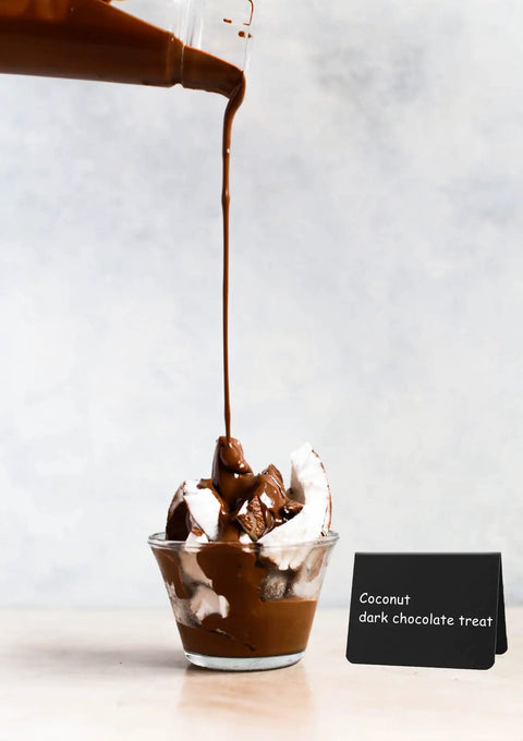 Coconut dark chocolate treat in a glass bowl with 20 Piece Mini Chalkboard Signs For Food, Reusable Buffet Table Labels visible.