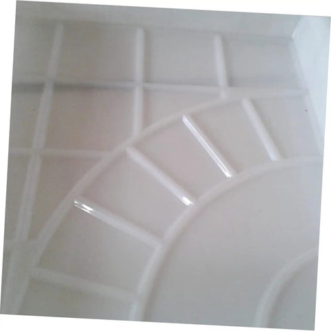 Top view of Easy To Use Reusable Concrete Stone Mold For DIY Garden Pathways Breeze Through Creating White Stepping Stones design.