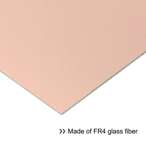 Close-up of Double Sided FR4 Copper Clad PCB 2 Pack 200 X 100 X 1.2mm Copper Plated Universal Prototype Circuit Board corner.