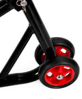 Close-up of front headlift stand for motorcycle with triple tree pins, featuring red wheels for stability and adjustable pins.