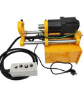Portable line boring machine with 110V motor, yellow frame and black components, side view showing control panel.