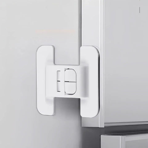 Sticky Mount Automatic Fridge Door Closers Set installed on cabinet door for locking mechanism, nonslip adhesive visible