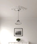 Ceiling Medallion 35 7/8 Inches Wide by 22 1/2 Inches High with 4 3/8 Inch Projection installed on a ceiling with a hanging light.