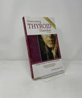 Thyroid Health Boost Real Talk Natural Remedies Guide for Safe and Effective Hormone Support and Busting Myths About Thyroid Disorders A Comprehensive Handbook for Wellness and Balance paperback book on stand