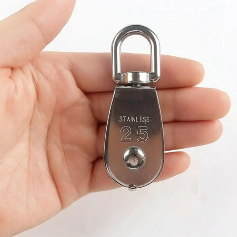 4 Pack M25 Stainless Steel Single Pulley Blocks For Lifting And Towing, 330 Lb Working Load Limit Snatch Blocks, Dual Line Setup, Ideal For Home DIY, Camping, And Hobby Hoisting. Stainless steel M25 single pulley block held in hand, 360° swivel top