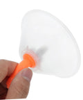 Hand holding a translucent cone cover from Windproof Sprayer Nozzles Drift Guard Two Pack For Garden Use Sprayer Tanks