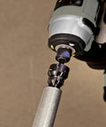 Power Conduit Reamer With Improved Bit Retention in use reaming one inch conduit, powered by a drill, showcasing hex bit storage.