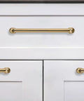 10 Pack 5 Inch Center To Center Brushed Brass Cabinet Pulls Heavy Duty Zinc Alloy Handles Installed On White Cabinets