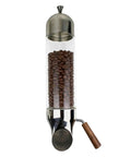 Straight Fire Kitchen Upgrade With This Wall Mounted Glass Tube Dispenser Featuring Adjustable Flow Settings For Coffee Beans Cereal Candy And Tea Goated Pantry Storage That Really Slaps No Cap with brown coffee beans visible.