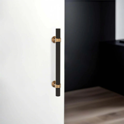 Five Inch Knurled Cabinet Pull in Matte Black and Champagne Bronze installed on a white kitchen cabinet, aluminum and zinc alloy handle by KOMOTIA.