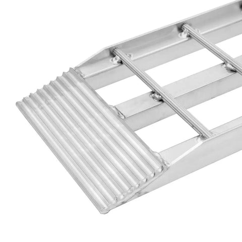 Close-up of Dual Runner Shed Ramps 3 Foot Long With Aluminum Serrated Rungs, showing serrated surface for traction.