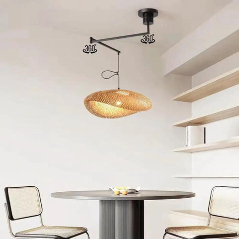 Chandelier Adjustable Hanging Light Fixtures, Modern Swing Arm Pendant,1 Long for Dining Room Kitchen Island Matte Black Finish(23.6in) above a table.