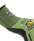 Green SpeedKnit S2EC06 Coated Knit Work Glove with HPPE, showing touchscreen compatibility and tactile feel, ANSI A4 cut resistance.