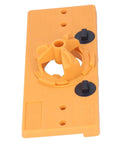 Yellow 35mm hinge hole jig drill guide with circular clamp and two black adjustment knobs