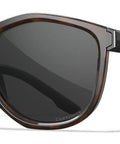 Top Shelf Shatterproof Sunglasses And Work Safety Shades Featuring Premium Polarized Grey Lenses For Men And Women Encased In A Dope Gloss Tortoise Build Packing Serious Uv Defense side view on white background.