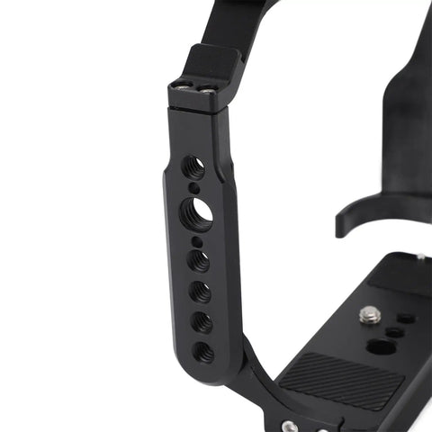 Close-up of Durable Aluminum Camera Cage Rig For R5II And R52 Full Protection 360 Shield with multiple mount ports visible