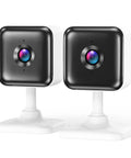 Two white and black 1080P FHD Indoor WiFi Security Cameras with night vision, suitable for baby, pet, and elderly care.