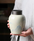 Top Shelf Ceramic Tea Canister With Airtight Lock Lid And Solid Loose Leaf Tea Storage Jar For Coffee Beans Nuts And Candy, decorative mountain design.