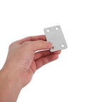 Close-up of a hand holding a stainless steel flat plate bracket, 1.1mm thick with 5mm holes, part of a 48 pack for home and office use.