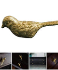 Brass Bird Knob Door Handle for Cabinets and Drawers on dark furniture, soft luster, romantic decorative accent.