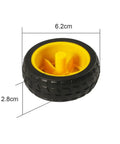 Close-up of a black and yellow wheel from the Four Pack TT Motors With 1 To 48 Gearbox Dual Shaft, 3 To 6V, 200 RPM, Wheel Kit For Arduino DIY Smart Car Robots