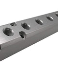 Heavy Duty 7 Way Aluminum Pneumatic Manifold Block With 2 G1/2 Inlets And 2 G1/4 Outlets shown from side angle