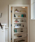 Hidden Door Hinge Kit For Secret Doors With 3 Way Adjustable Concealed Hinges, Zinc Alloy, Black Finish, shown on a bookshelf door