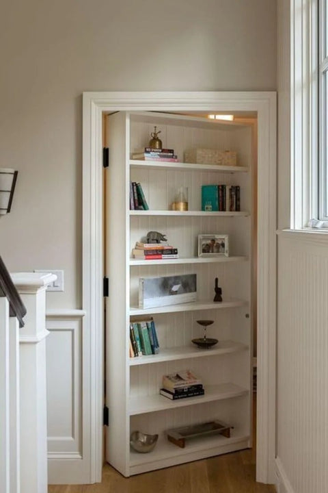 Hidden Door Hinge Kit For Secret Doors With 3 Way Adjustable Concealed Hinges, Zinc Alloy, Black Finish, shown on a bookshelf door