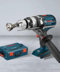 Blue cordless drill with deburring chamfer tool attached in the chuck; blue case on the floor.