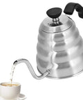 Gooseneck Coffee Kettle 304 Stainless Steel, 1200ml Capacity, pouring water into a cup, Pro-Grade Pour Spout for precise use.