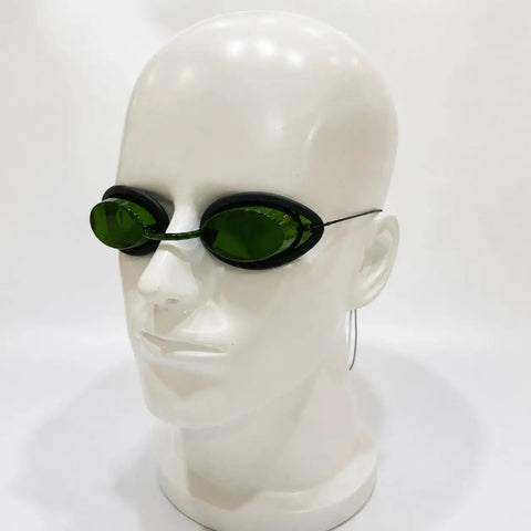 Straight Up Heavy Duty Opt Ipl Laser Safety Goggles For Red Light Therapy And Photon Beauty Machines with green lens, displayed on a mannequin head.