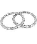 Close-up of Four Pack 37 Point 2 Millimeter Bicycle Ball Bearing Cage Set With 16 Balls for crank and wheel retainers, steel build.