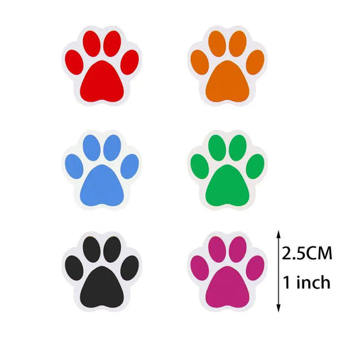 Dog Paw Print Stickers Roll 500 Self Adhesive Paw Labels Colorful Animal Shape Wall Decals Perfect For Vet Tech Gifts Classroom Decor Envelope Seals Party Tags And Gift Wrapping. Six colorful dog paw print stickers on paper shown with size scale.