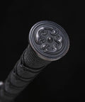 Pommel of Hand-Forged Damascus Han Sword With 42-Inch Battle-Ready Chinese Longquan Blade showing intricate kirsite fittings.