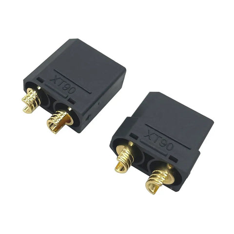 XT90 Bullet Connector Set With Heat Shrink 5 Pairs Male And Female High Current RC Lipo Battery Power Plugs Reusable Up To 1000 Times Durable Nylon Housing For Motors ESC RC Cars Drones in close-up showing two connectors with gold tips and nylon housing