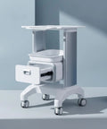Straight Up Perfect Beauty Salon Cart Featuring Smooth Rolling Trolley Pull Out Drawer And Roomy Top Tray For Cosmetics sleek design with white finish and rollers.