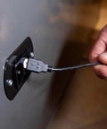 Person plugging a USB into Interior Safe Power Outlet Kit With USB And Ethernet For Dehumidifiers And Lights Powering Your Inside Safe Accessories Fits 2007 And Later Safes Easy Install For Better Organization And Security.