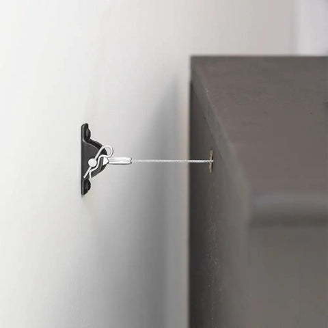 Heavy Duty Anti Tip Kit That Keeps Furniture From Falling Up To 400lbs With Tamper Resistant Steel Cable System secured to cabinet