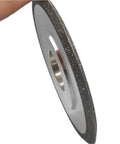 Heavy Duty SDC Grinding Wheel And Sharpening Disc Rock Solid 125mm close-up view showing the diamond abrasive edge and 32mm arbor hole.