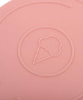 Close-up of pink silicone freeze container guard sleeve for Ninja Creami ice cream maker dust leak protection dishwasher safe